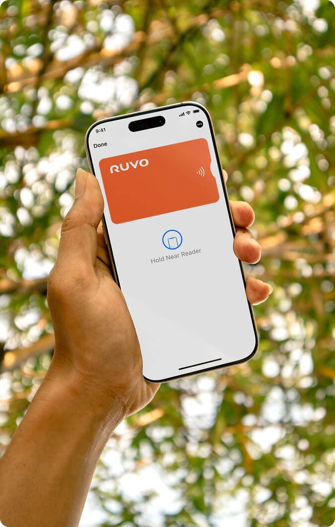 Hand holding phone with Ruvo card